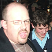 look behind Grumpy there's another little Monkey