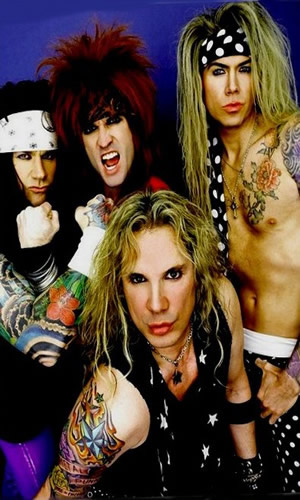 click here to see the YouTube Steel Panther kissing under the camel toe